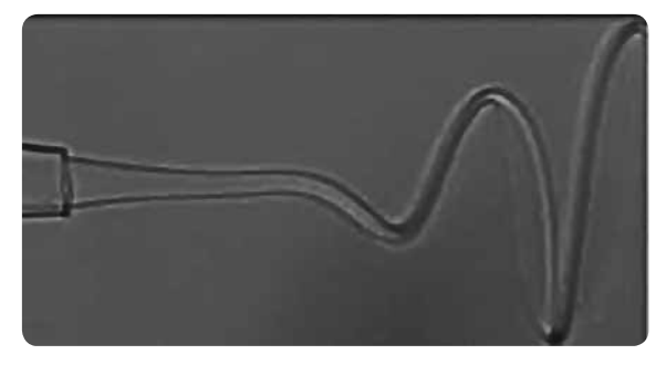 Controlled whipping of an electrified jet in the presence of a coflowing external liquid Controlled whipping of an electrified jet in the presence of a coflowing external liquid